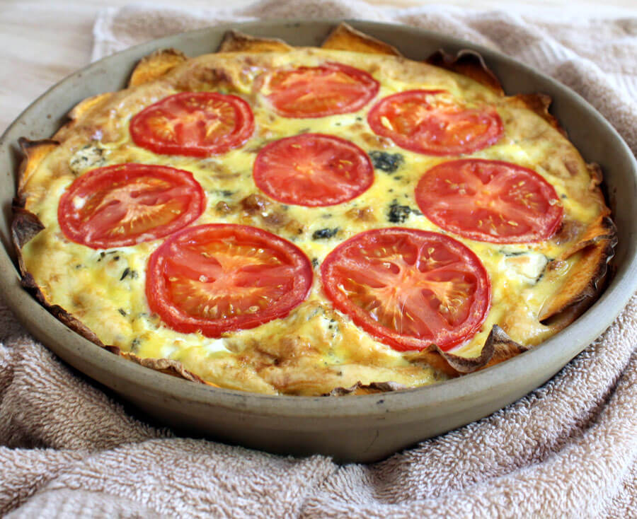 Sweet Potato Quiche with Caramelized Onion, Tomato, and Goat Cheese