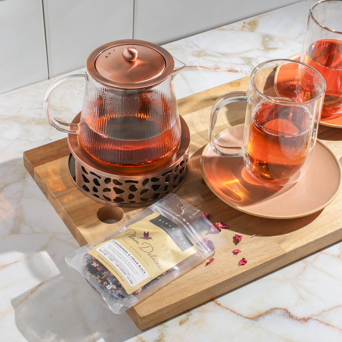 https://www.plumdeluxe.com/cdn/shop/articles/Copper-Rose-Teapot-Perfect-Tea-Mug.png?v=1699048515&width=1100