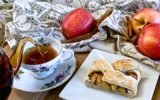 This fall, fall in love with apple strudel! Flakey puff pastry, cinnamon-dusted apple, tender ribbons of vanilla icing, this easy apple strudel recipe will be love at first bite!