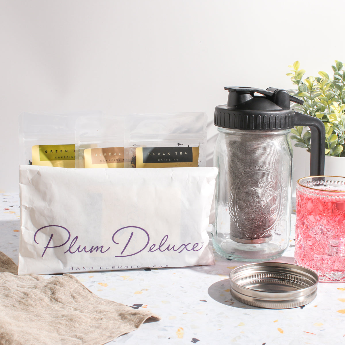 https://www.plumdeluxe.com/cdn/shop/files/Maison-Brew-Kit-lifestyle-square-with-iced-tea-trio.jpg?v=1684435778